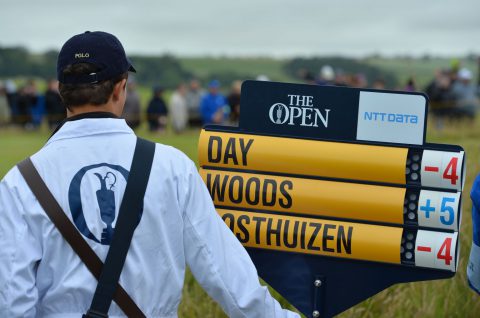 A mobile scoreboard displays Tiger Woods' troubles on the opening day of the 2015 British Open Golf Championship on The Old Course at St Andrews in Scotland, on July 16, 2015. Tiger Woods had another round of major misery and already he is facing a battle to avoid a third missed cut in the last four majors. AFP PHOTO / GLYN KIRK        (Photo credit should read GLYN KIRK/AFP/Getty Images)