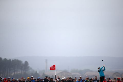 ST ANDREWS, SCOTLAND - JULY 16:  Justin Rose of England hits a tee shot during the first round of the 144th Open Championship at The Old Course on July 16, 2015 in St Andrews, Scotland.  (Photo by Streeter Lecka/Getty Images)
