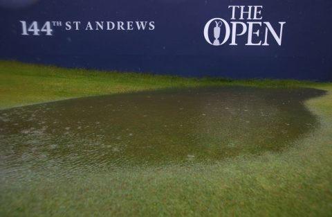 ST ANDREWS, SCOTLAND - JULY 17:  Puddles form on the course as rain falls prior to the second round of the 144th Open Championship at The Old Course on July 17, 2015 in St Andrews, Scotland. Play is suspended due to adverse weather conditions.  (Photo by Matthew Lewis/Getty Images)