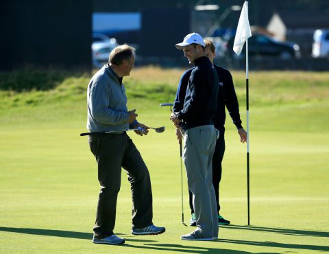 ST ANDREWS, SCOTLAND - SEPTEMBER 29:  Martin Kaymer of Germany with his father Horst Kaymer on the first green during the first practise round of the 2015 Alfred Dunhill Links Championship at The Old Course on September 29, 2015 in St Andrews, Scotland.  (Photo by David Cannon/Getty Images)