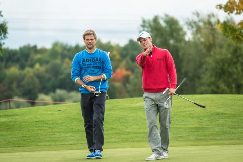 Martin Kaymer mit Hockey-Olympiasieger Moritz Fürste