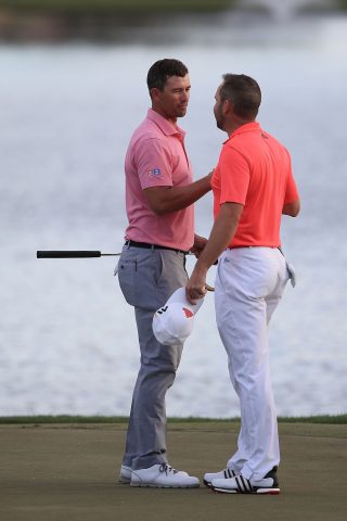 PALM BEACH GARDENS, FL - FEBRUARY 28: Adam Scott of Australia speaks with Sergio Garcia of Spain following his one shot victory during the final round of the Honda Classic at PGA National Resort & Spa - Champions Course on February 28, 2016 in Palm Beach Gardens, Florida. (Photo by Sam Greenwood/Getty Images)