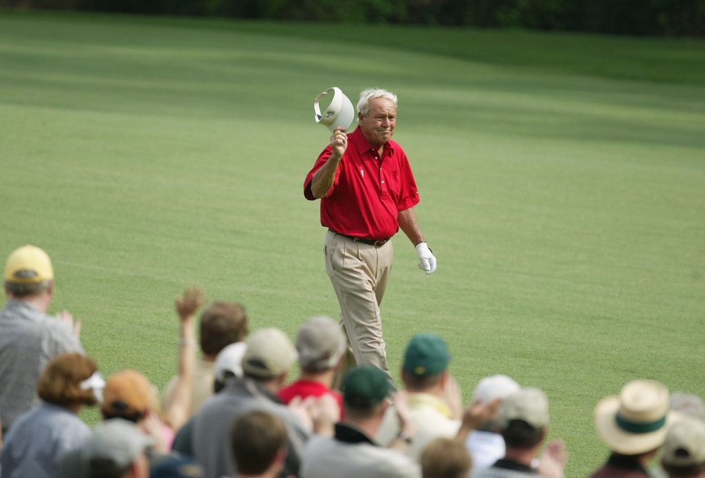 AUGUSTA, GA - APRIL 9: Arnold Palmer waves to the crowd on the 13th hole during the second round of the Masters at the Augusta National Golf Club on April 9, 2004 in Augusta, Georgia. (Photo by David Cannon/Getty Images)