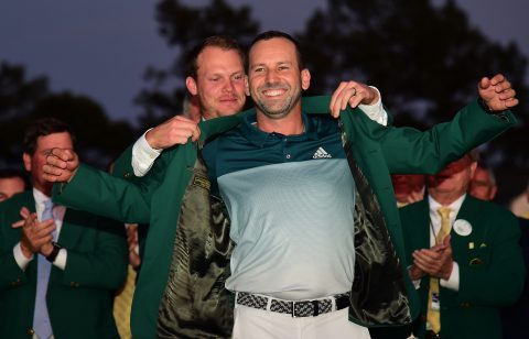 AUGUSTA, GA - APRIL 09: Danny Willett of England presents Sergio Garcia of Spain with the Green Jacket after Garcia won in a playoff during the final round of the 2017 Masters Tournament at Augusta National Golf Club on April 9, 2017 in Augusta, Georgia. (Photo by Harry How/Getty Images)