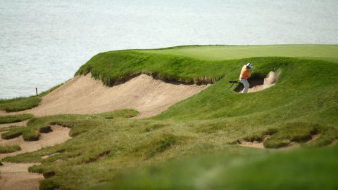 SHEBOYGAN, WI - AUGUST 12: George Coetzee of South Africa hits out of the bunkers during a practice round prior to the 2015 PGA Championship at Whistling Straits on August 12, 2015 in Sheboygan, Wisconsin. (Photo by Richard Heathcote/Getty Images)