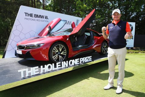 VIRGINIA WATER, ENGLAND - MAY 29: James Morrison of England poses with his new BMW i8 car after his hole-in-one on the 14th during day four of the BMW PGA Championship at Wentworth on May 29, 2016 in Virginia Water, England. (Photo by Andrew Redington/Getty Images)