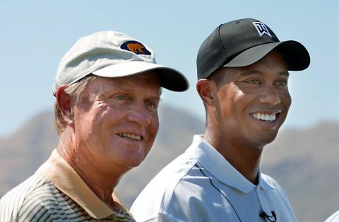 PALM DESERT, UNITED STATES: Golf legends Jack Nicklaus (L) and Tiger Woods (R) pose for photographs prior to the beginning of play at the Battle at Bighorn that will pit Woods and Nicklaus against Sergio Garcia and Lee Trevino 29 July, 2002 at Palm Desert, California. AFP PHOTO/Mike NELSON (Photo credit should read MIKE NELSON/AFP/Getty Images)