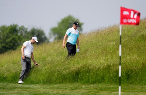HARTFORD, WI - JUNE 12: Alexander Noren of Sweden and Martin Kaymer of Germany look for a ball on the 17th hole during a practice round prior to the 2017 U.S. Open at Erin Hills on June 12, 2017 in Hartford, Wisconsin. (Photo by Jamie Squire/Getty Images)