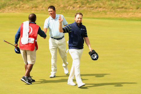 SOUTHPORT, ENGLAND - JULY 22: Branden Grace of South Africa acknowledges the crowd on the 18th green after shooting a 62, the lowest round in major history during the third round of the 146th Open Championship at Royal Birkdale on July 22, 2017 in Southport, England. (Photo by Andrew Redington/Getty Images)