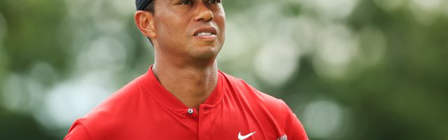 BMW Championship - Final Round MEDINAH, ILLINOIS - AUGUST 18: Tiger Woods of the United States walks on the 18th hole during the final round of the BMW Championship at Medinah Country Club No. 3 on August 18, 2019 in Medinah, Illinois. (Photo by Andrew Redington/Getty Images) 