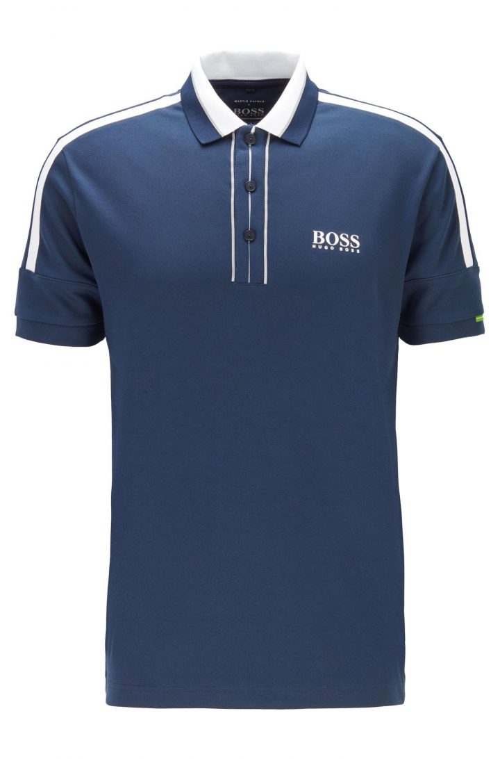 »Paddy MK«: Das Hugo Boss-Polo in Regular-Fit-Passform ist in jeder Farbe ein Hingucker. Die Akzente werden durch den Colour-Block-Kragen, kontrastfarbene Streifen an Knopfleiste und Ärmeln sowie das Logo auf Brust und Nacken gesetzt. Nachhaltigkeit spielt bei dem innovativen Shirt eine große Rolle – es besteht ausschließlich aus einem recycelten Material-Mix. Farben: Blau, Dunkelblau, Rot, Schwarz Preis: 129,95 Euro