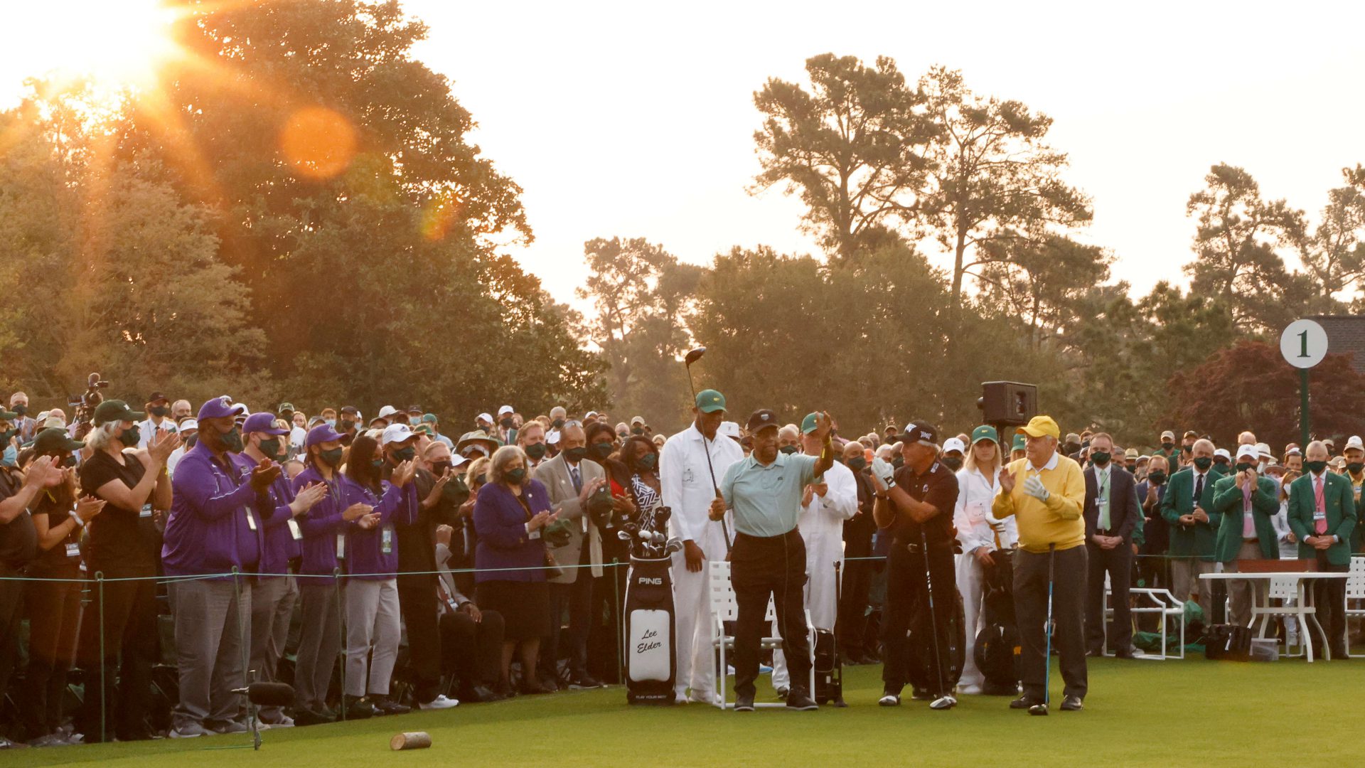 Honorary Starter Lee Elder of the United States (L), waves to the crowd as he is introduced and honorary starter and Masters champion Gary Player of South Africa and honorary starter and Masters champion Jack Nicklaus look on from the first tee during the opening ceremony prior to the start of the first round of the Masters at Augusta National Golf Club on April 08, 2021 in Augusta, Georgia. (Photo by Jared C. Tilton/Getty Images)