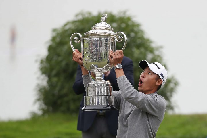 SAN FRANCISCO, CALIFORNIA - AUGUST 09: Collin Morikawa of the United States reacts as the lid to the Wanamaker Trophy falls off during the trophy presentation after the final round of the 2020 PGA Championship at TPC Harding Park on August 09, 2020 in San Francisco, California. (Photo by Sean M. Haffey/Getty Images)