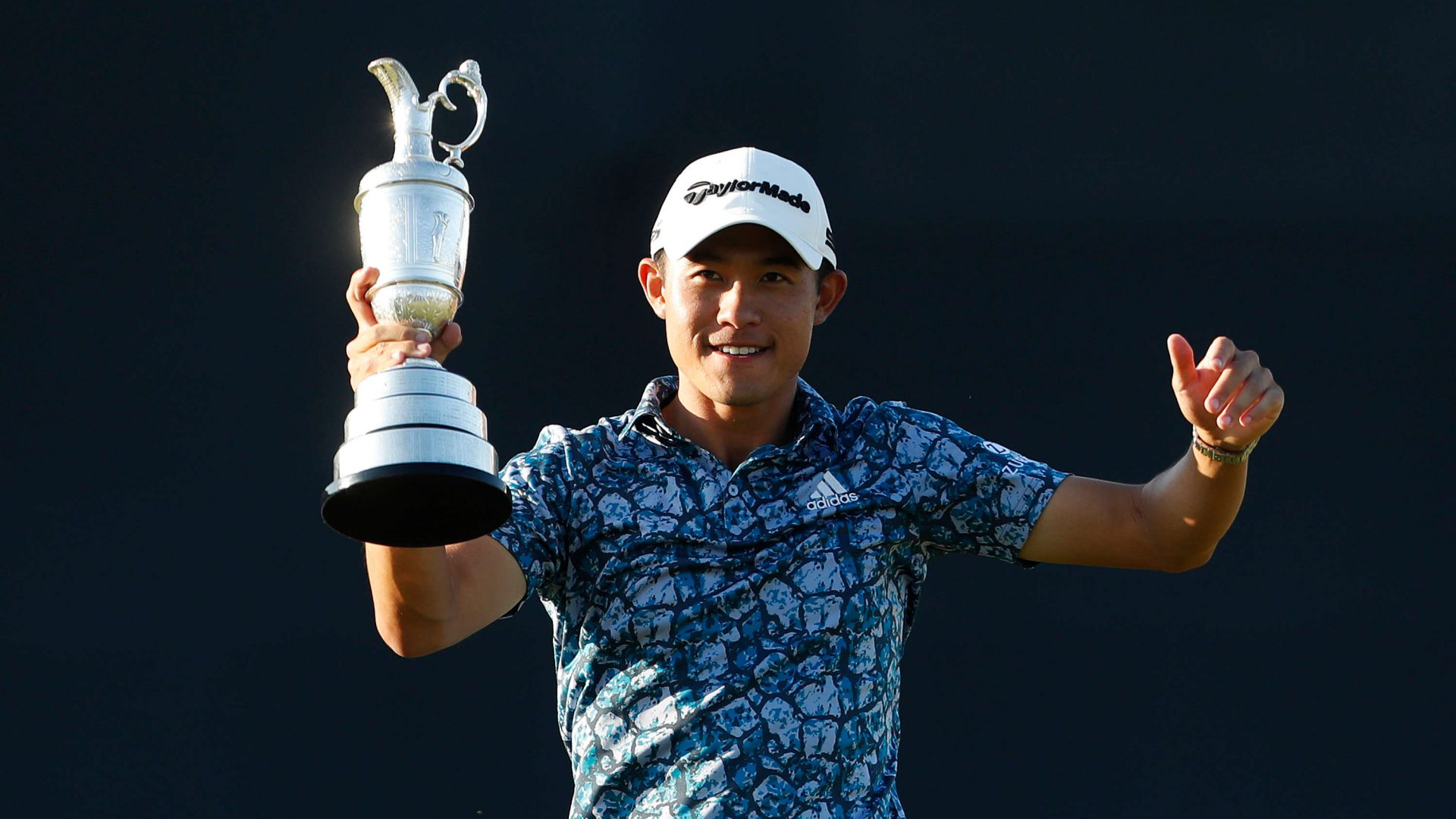 SANDWICH, ENGLAND - JULY 18: Open Champion, Collin Morikawa of United States celebrates with the Claret Jug on the 18th hole during Day Four of The 149th Open at Royal St George’s Golf Club on July 18, 2021 in Sandwich, England. (Photo by Oisin Keniry/Getty Images)