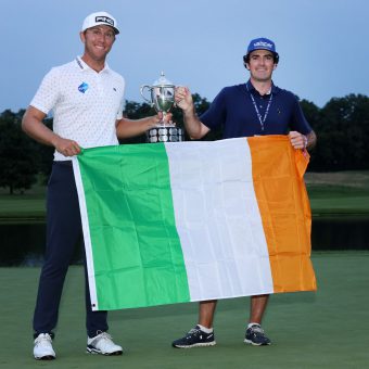 NICHOLASVILLE, KENTUCKY - JULY 18: Seamus Power of Ireland poses with the trophy and his caddie Aaron Flener after putting in to win on the 18th hole during the sixth playoff hole during the final round of the Barbasol Championship at Keene Trace Golf Club on July 18, 2021 in Nicholasville, Kentucky. (Photo by Andy Lyons/Getty Images)