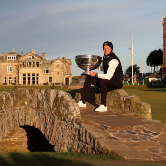 ST ANDREWS, SCOTLAND - OCTOBER 03: Danny Willett of England poses with the trophy on the Swilcan Bridge on the 18th hole following victory during Day Four of The Alfred Dunhill Links Championship at The Old Course on October 03, 2021 in St Andrews, Scotland. (Photo by Matthew Lewis/Getty Images)