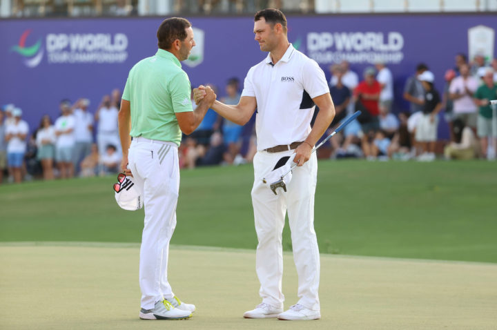 Martin Kaymer of Germany and Sergio Garcia of Spain shake hands at the 18th green during Day Two of The DP World Tour Championship at Jumeirah Golf Estates on November 19, 2021 in Dubai, United Arab Emirates. (Photo by Andrew Redington/Getty Images)
