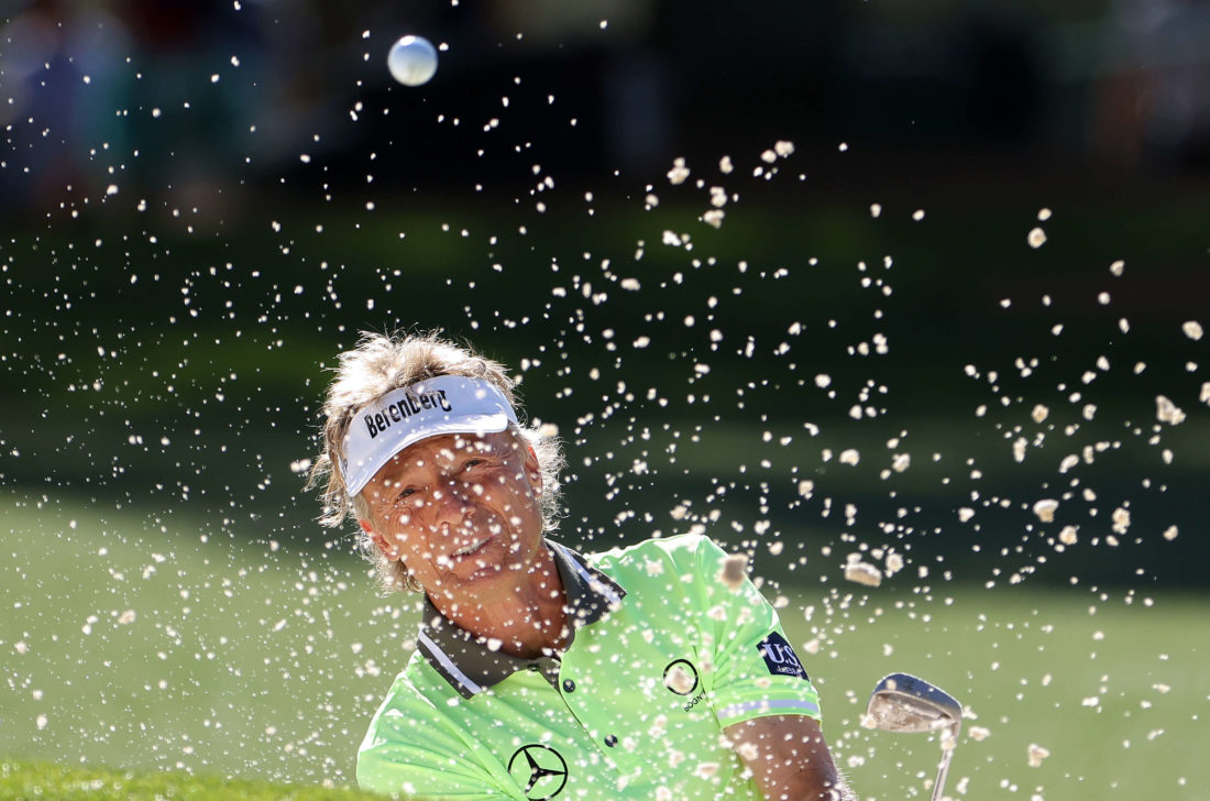 AUGUSTA, GEORGIA - APRIL 07: Bernhard Langer of Germany plays his shot from the bunker on the 17th hole during the first round of the Masters at Augusta National Golf Club on April 07, 2022 in Augusta, Georgia. (Photo by Jamie Squire/Getty Images)