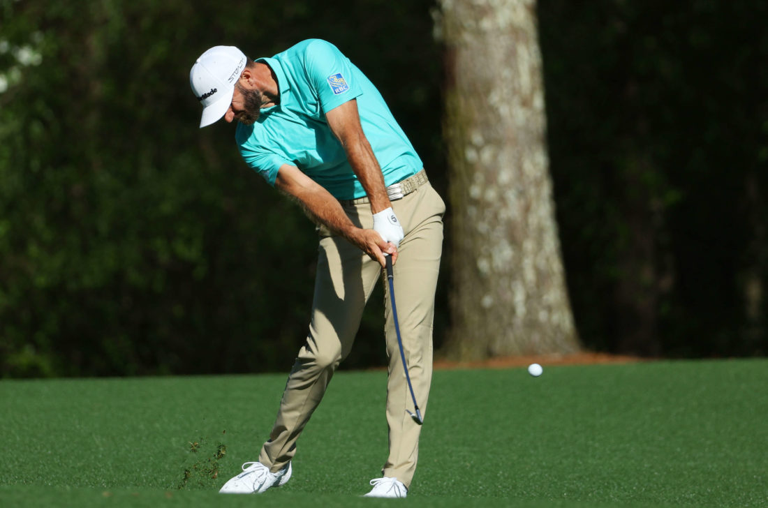 AUGUSTA, GEORGIA - APRIL 07: Dustin Johnson plays his shot on the 11th hole during the first round of the Masters at Augusta National Golf Club on April 07, 2022 in Augusta, Georgia. (Photo by Andrew Redington/Getty Images)