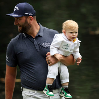 AUGUSTA, GEORGIA - APRIL 06: Jon Rahm of Spain and his son Kepa Rahm during the Par Three Contest prior to the Masters at Augusta National Golf Club on April 06, 2022 in Augusta, Georgia. (Photo by Gregory Shamus/Getty Images)