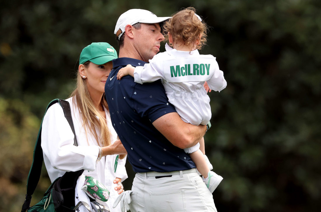 AUGUSTA, GEORGIA - APRIL 06: Rory McIlroy of Northern Ireland wife Erica Stoll and daughter Poppy McIlroy during the Par Three Contest prior to the Masters at Augusta National Golf Club on April 06, 2022 in Augusta, Georgia. (Photo by Jamie Squire/Getty Images)