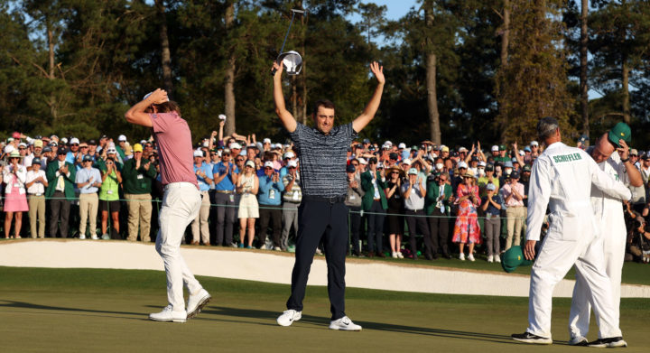 AUGUSTA, GEORGIA - APRIL 10: Scottie Scheffler celebrates on the 18th green after winning the Masters at Augusta National Golf Club on April 10, 2022 in Augusta, Georgia. (Photo by Jamie Squire/Getty Images)