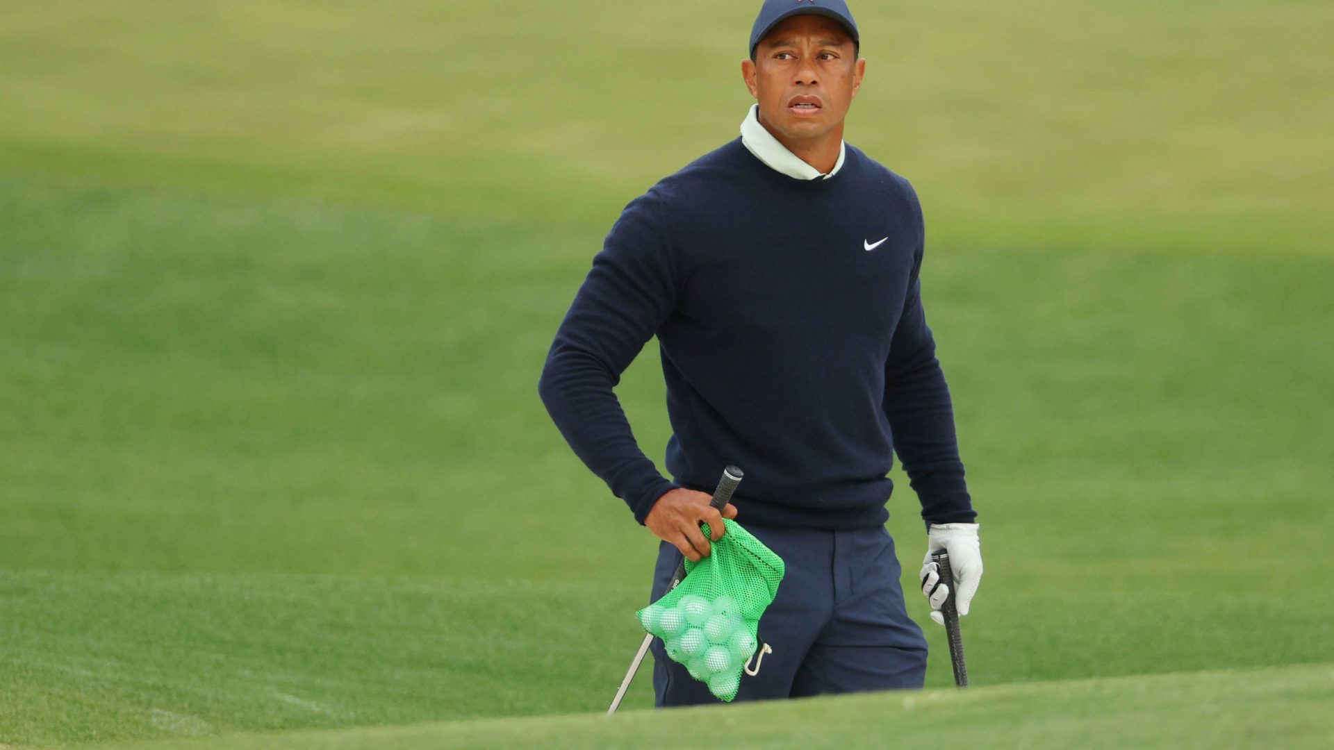 AUGUSTA, GEORGIA - APRIL 05: Tiger Woods of the United States warms up on the range during a practice round prior to the Masters at Augusta National Golf Club on April 05, 2022 in Augusta, Georgia. (Photo by Andrew Redington/Getty Images)