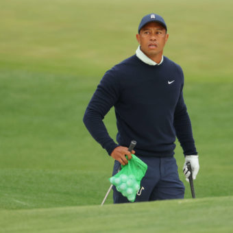 AUGUSTA, GEORGIA - APRIL 05: Tiger Woods of the United States warms up on the range during a practice round prior to the Masters at Augusta National Golf Club on April 05, 2022 in Augusta, Georgia. (Photo by Andrew Redington/Getty Images)