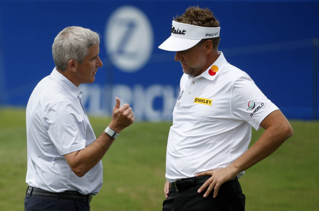 AVONDALE, LOUISIANA - APRIL 20: Ian Poulter talks with PGA TOUR Commissioner Jay Monahan during a pro-am prior to the Zurich Classic of New Orleans at TPC Louisiana on April 20, 2022 in Avondale, Louisiana. (Photo by Chris Graythen/Getty Images)