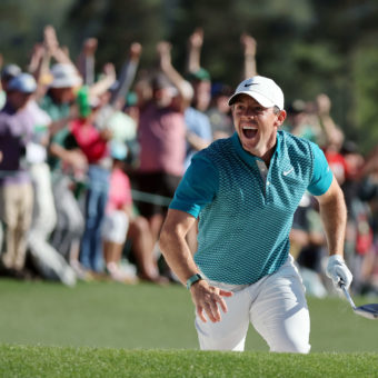 AUGUSTA, GEORGIA - APRIL 10: Rory McIlroy of Northern Ireland reacts after chipping in for birdie from the bunker on the 18th green during the final round of the Masters at Augusta National Golf Club on April 10, 2022 in Augusta, Georgia. (Photo by Gregory Shamus/Getty Images)