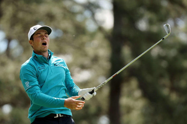 AUGUSTA, GEORGIA - APRIL 08: Viktor Hovland of Norway reacts to his shot from the fourth tee during the second round of The Masters at Augusta National Golf Club on April 08, 2022 in Augusta, Georgia. (Photo by Gregory Shamus/Getty Images)