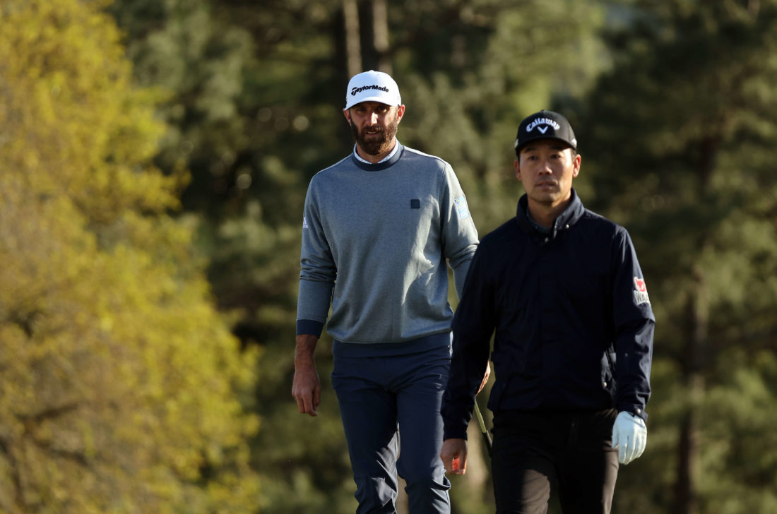 tour news-AUGUSTA, GEORGIA - APRIL 09: Dustin Johnson (L) and Kevin Na walk to the 18th green during the third round of the Masters at Augusta National Golf Club on April 09, 2022 in Augusta, Georgia. (Photo by Gregory Shamus/Getty Images)