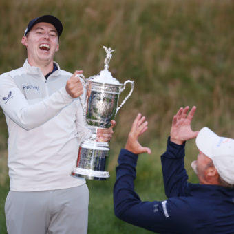 BROOKLINE, MASSACHUSETTS - JUNE 19: (L-R) Matt Fitzpatrick of England and caddie Billy Foster celebrate with the U.S. Open Championship trophy after winning during the final round of the 122nd U.S. Open Championship at The Country Club on June 19, 2022 in Brookline, Massachusetts. (Photo by Warren Little/Getty Images)
