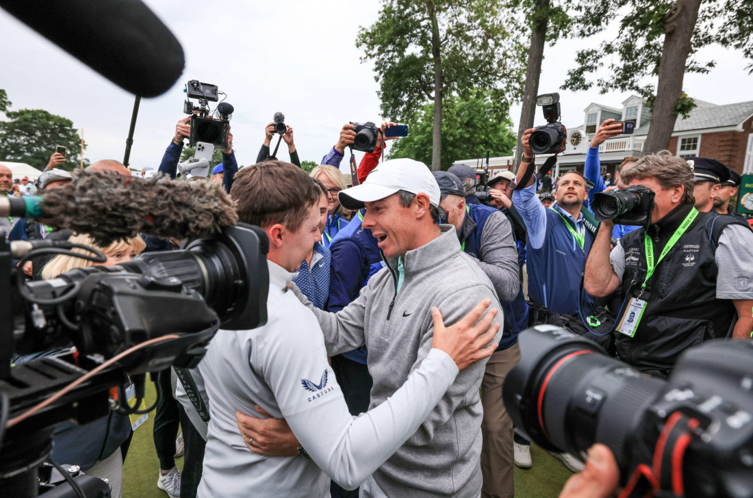 BROOKLINE, MASSACHUSETTS - JUNE 19: Matthew Fitzpatrick of England is congratulated by Rory McIlroy of Northern Ireland after Fitzpatrick had won on the 18th hole during the final round of the 2022 U.S.Open at The Country Club on June 19, 2022 in Brookline, Massachusetts. tour news (Photo by David Cannon/Getty Images)