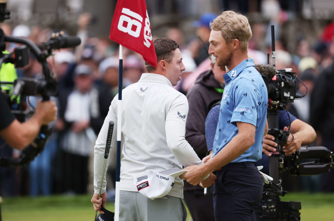 BROOKLINE, MASSACHUSETTS - tour news JUNE 19: (L-R) Matt Fitzpatrick of England shakes hands with Will Zalatoris of the United States after Fitzpatrick's victory on the 18th green during the final round of the 122nd U.S. Open Championship at The Country Club on June 19, 2022 in Brookline, Massachusetts. (Photo by Warren Little/Getty Images)