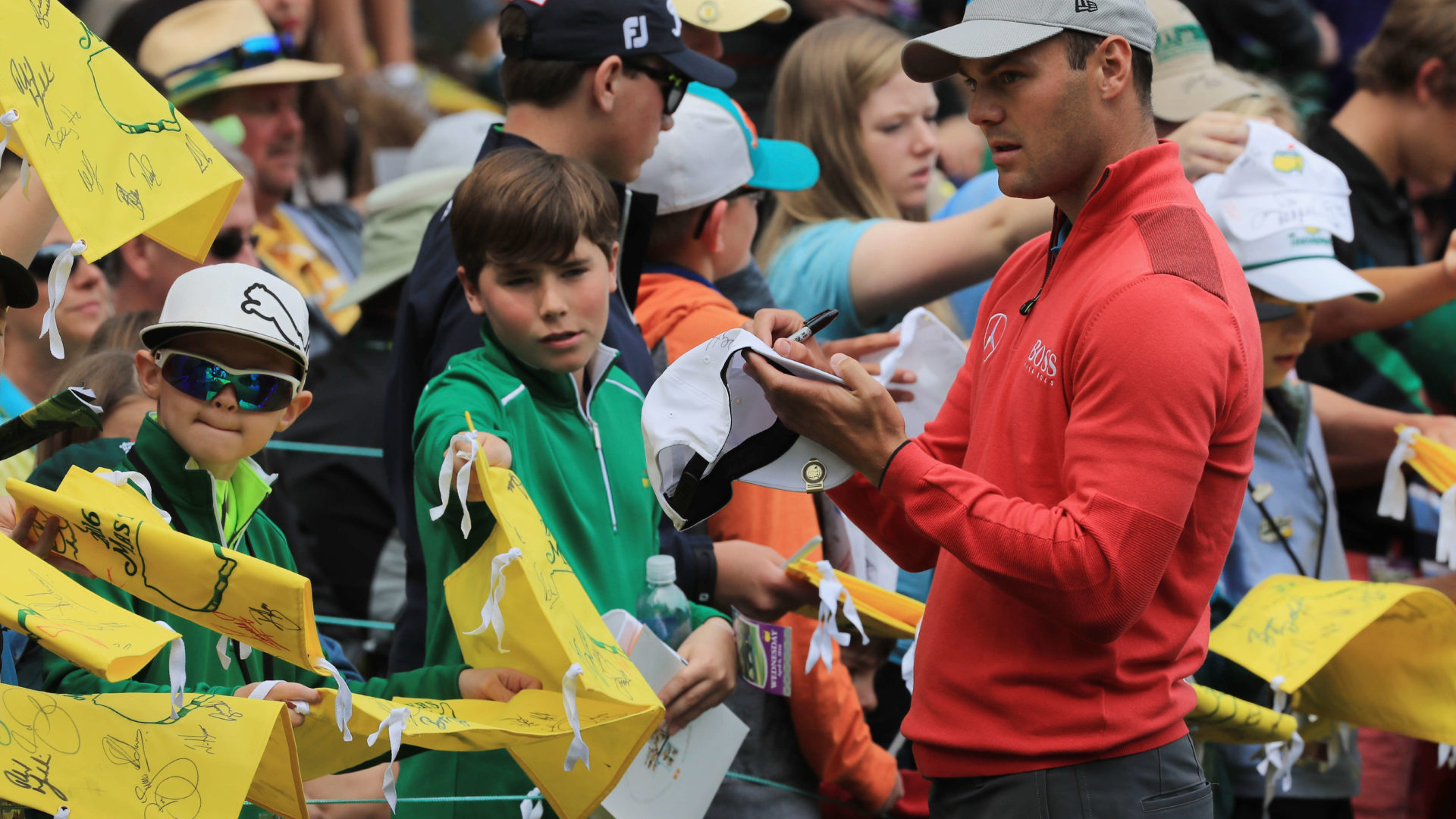 AUGUSTA, GA - APRIL 06: Martin Kaymer of Germany signs autographs during a practice round prior to the start of the 2016 Masters Tournament at the Augusta National Golf Club on April 6, 2016 in Augusta, Georgia. (Photo by Scott Halleran/Getty Images for Golfweek)