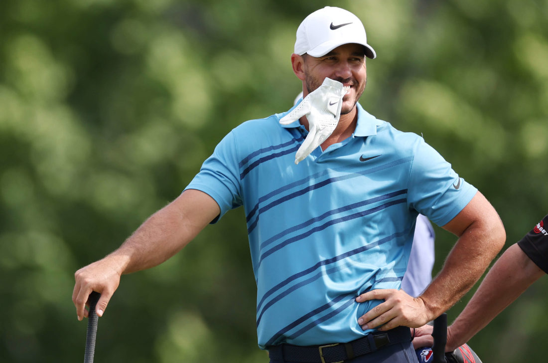 BROOKLINE, MASSACHUSETTS - JUNE 13: Brooks Koepka of the United States smiles on the eighth tee during a practice round prior to the 2022 U.S. Open at The Country Club on June 13, 2022 in Brookline, Massachusetts. (Photo by Rob Carr/Getty Images)