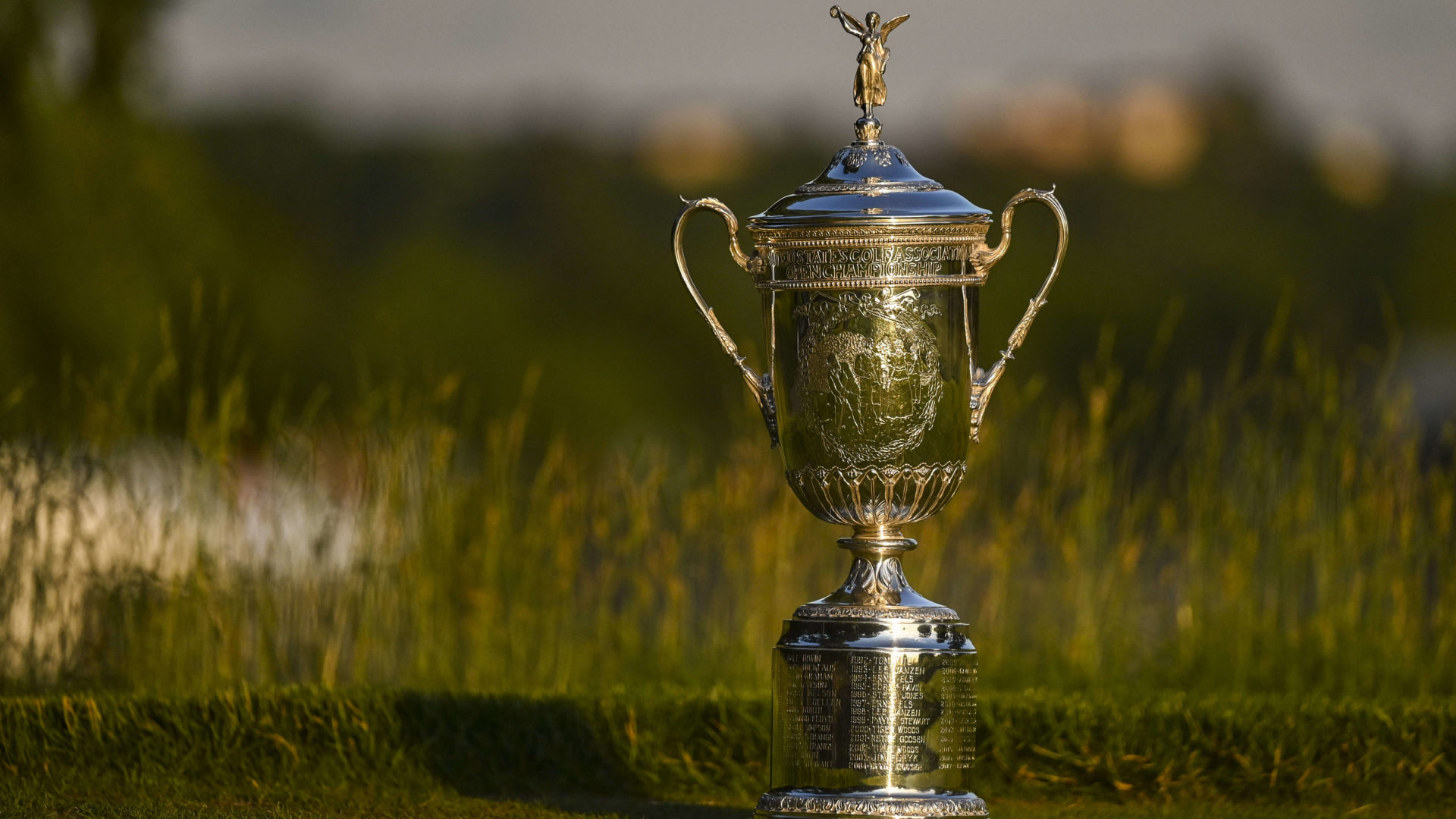 BROOKLINE, MA - JUNE 13: The U.S. Open trophy at sunset during practice for the U.S. Open at The Country Club on June 13, 2022 in Brookline, Massachusetts. (Photo by Keyur Khamar/PGA TOUR via Getty Images)