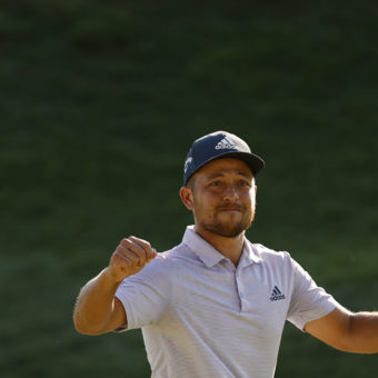 CROMWELL, CONNECTICUT - JUNE 26: Xander Schauffele of the United States reacts after putting in to win on the 18th green during the final round of Travelers Championship at TPC River Highlands on June 26, 2022 in Cromwell, Connecticut. (Photo by Tim Nwachukwu/Getty Images)