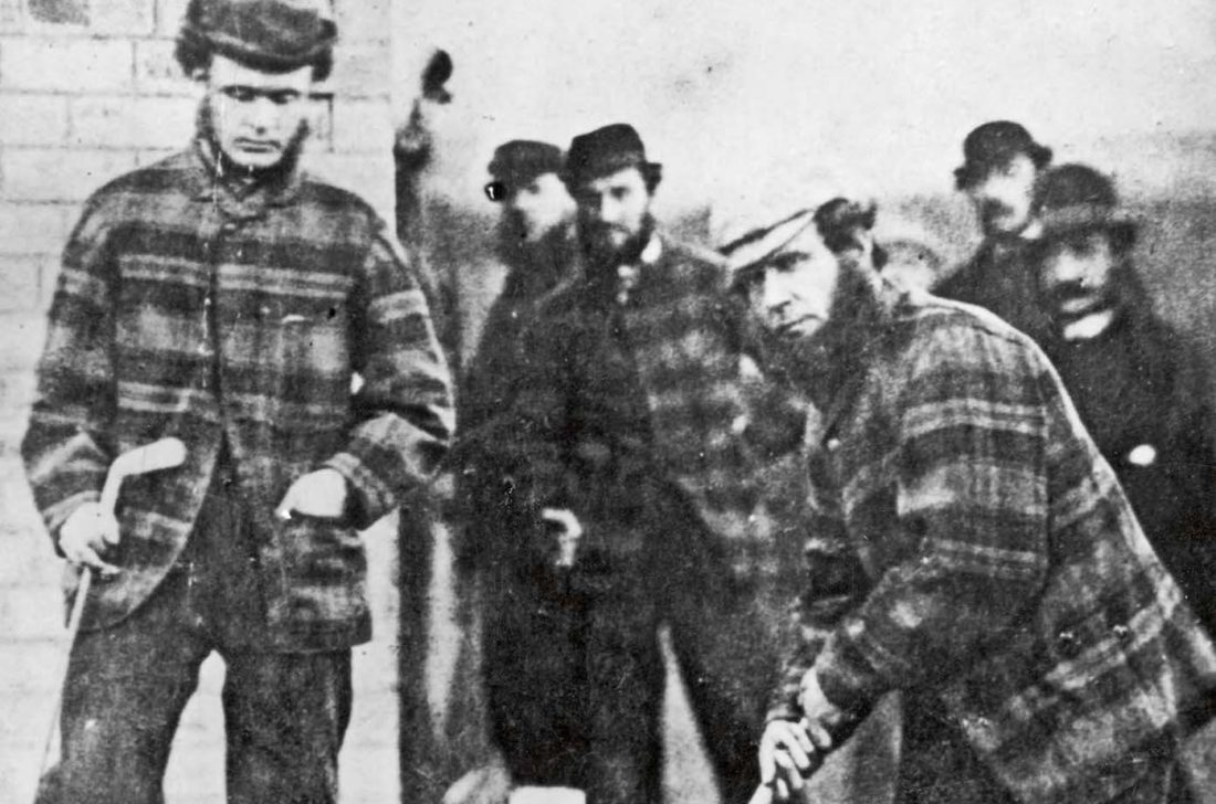 1860: British golfers 'Old' Tom Morris (1821 - 1908) and Charlie Hunter at a match at Prestwick, Ayrshire. 'Old' Tom and his son 'Young' Tom became the only father and son to hold successive open titles when 'Old' Tom became the oldest player to win a title, aged 46 years and 99 days, in 1867 and 'Young' Tom won in 1868. In the following year he won again and his father finished second. 'Old' Tom later ran a golfing equipment shop. (Photo by Hulton Archive/Getty Images)