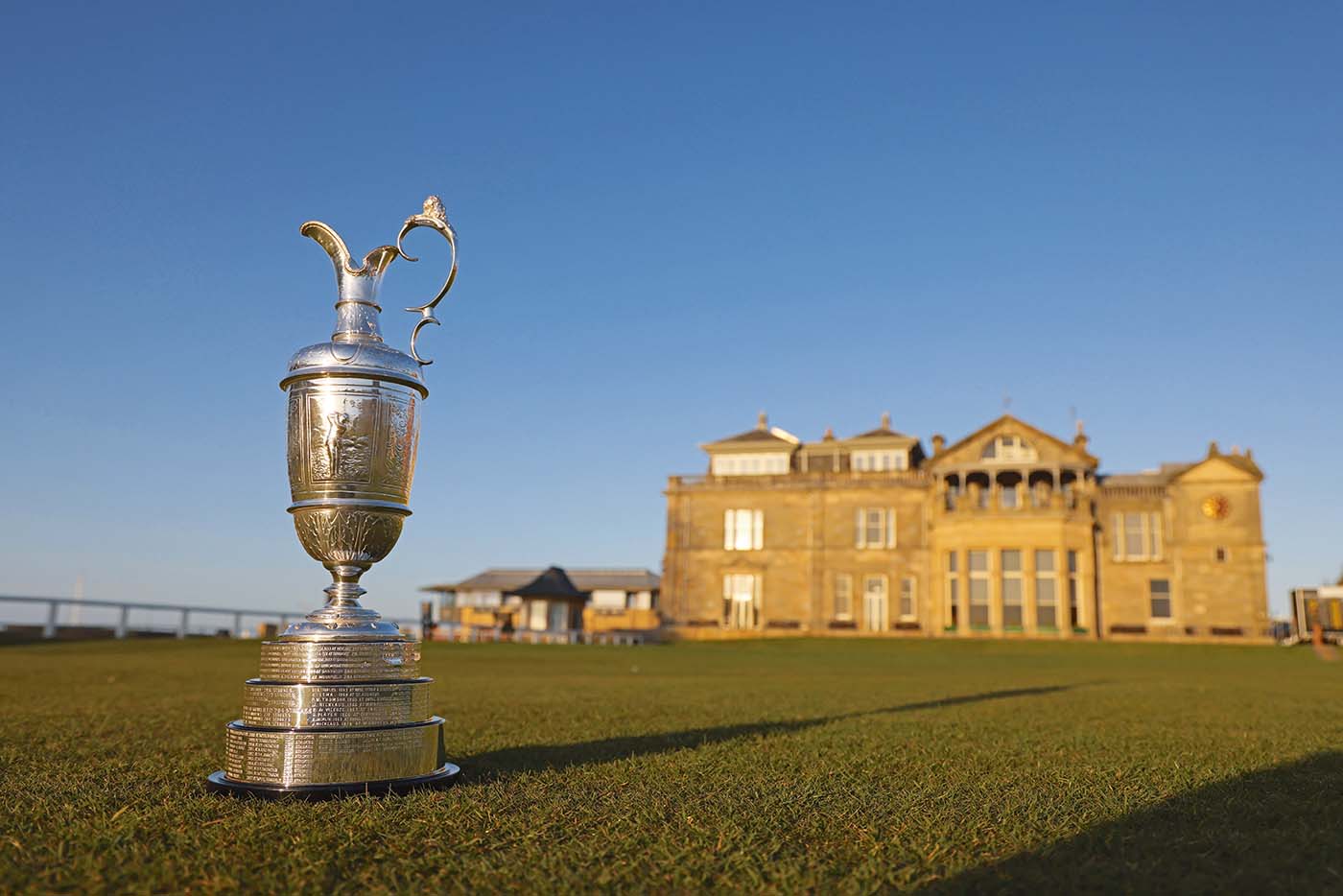 ST ANDREWS, SCOTLAND - APRIL 27: The Claret Jug sits on the first tee of The Old Course in front of the R&A Clubhouse at St Andrews on April 27, 2022 in St Andrews, Scotland. The 150th Open Championship will take place on The Old Course at St Andrews between the 14th and 17th July. (Photo by Richard Heathcote/R&A/R&A via Getty Images)