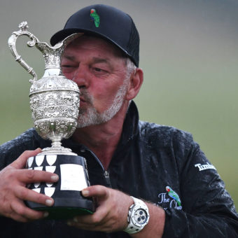 AUCHTERADER, SCOTLAND - JULY 24: Darren Clarke of Northern Ireland poses with the trophy as he wins the Senior Open Presented by Rolex at The King's Course at Gleneagles on July 24, 2022 in Auchterarder, United Kingdom. tour news (Photo by Mark Runnacles/Getty Images)