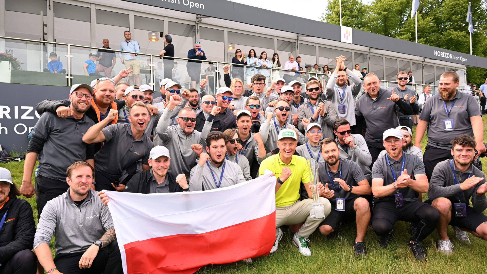 THOMASTOWN, IRELAND - JULY 03: Adrian Meronk of Poland is congratulated as he poses with the trophy as he wins the Horizon Irish Open at Mount Juliet Estate on July 03, 2022 in Thomastown, Ireland. tour news (Photo by Ross Kinnaird/Getty Images)