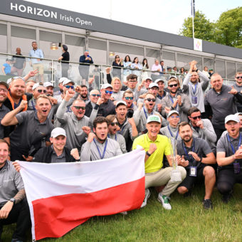 THOMASTOWN, IRELAND - JULY 03: Adrian Meronk of Poland is congratulated as he poses with the trophy as he wins the Horizon Irish Open at Mount Juliet Estate on July 03, 2022 in Thomastown, Ireland. tour news (Photo by Ross Kinnaird/Getty Images)