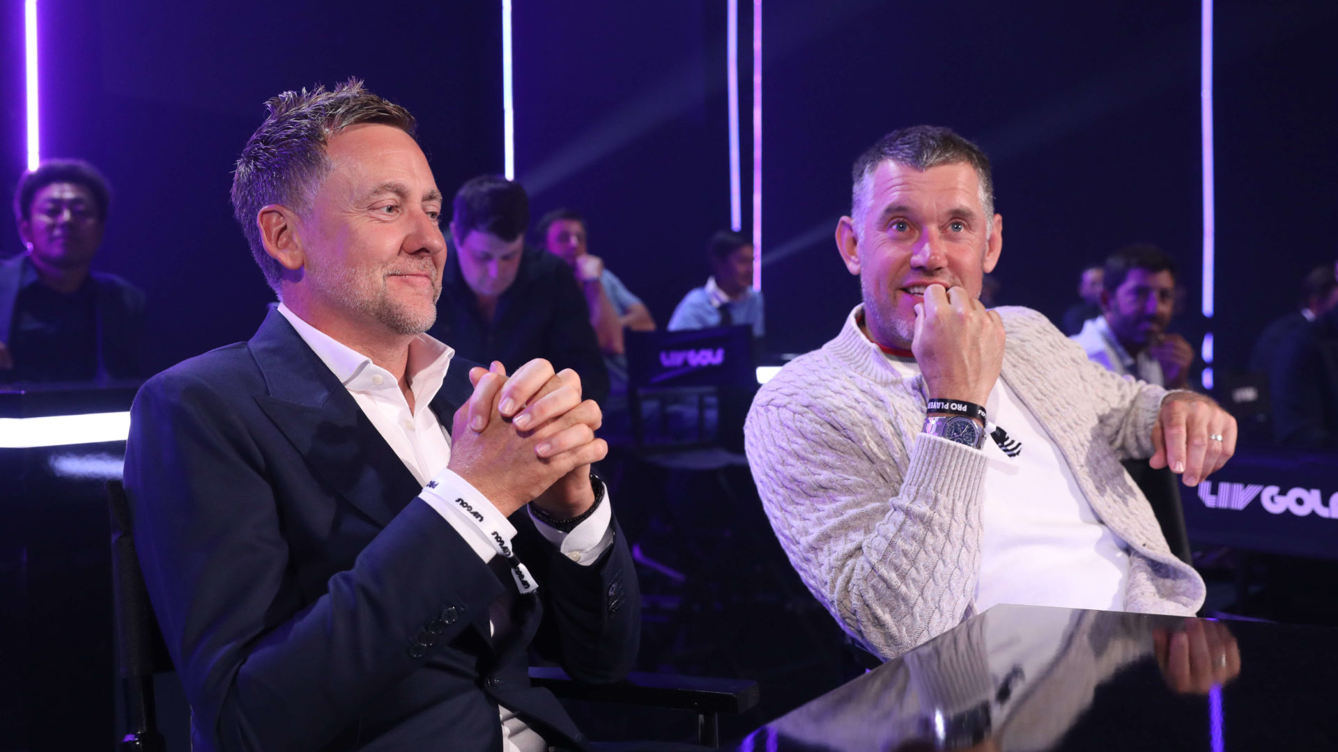 LONDON, ENGLAND - JUNE 07: Ian Poulter and Lee Westwood of England look on during the LIV Golf Invitational - London Draft on June 07, 2022 in London, England. (Photo by Tristan Fewings/LIV Golf/Getty Images)