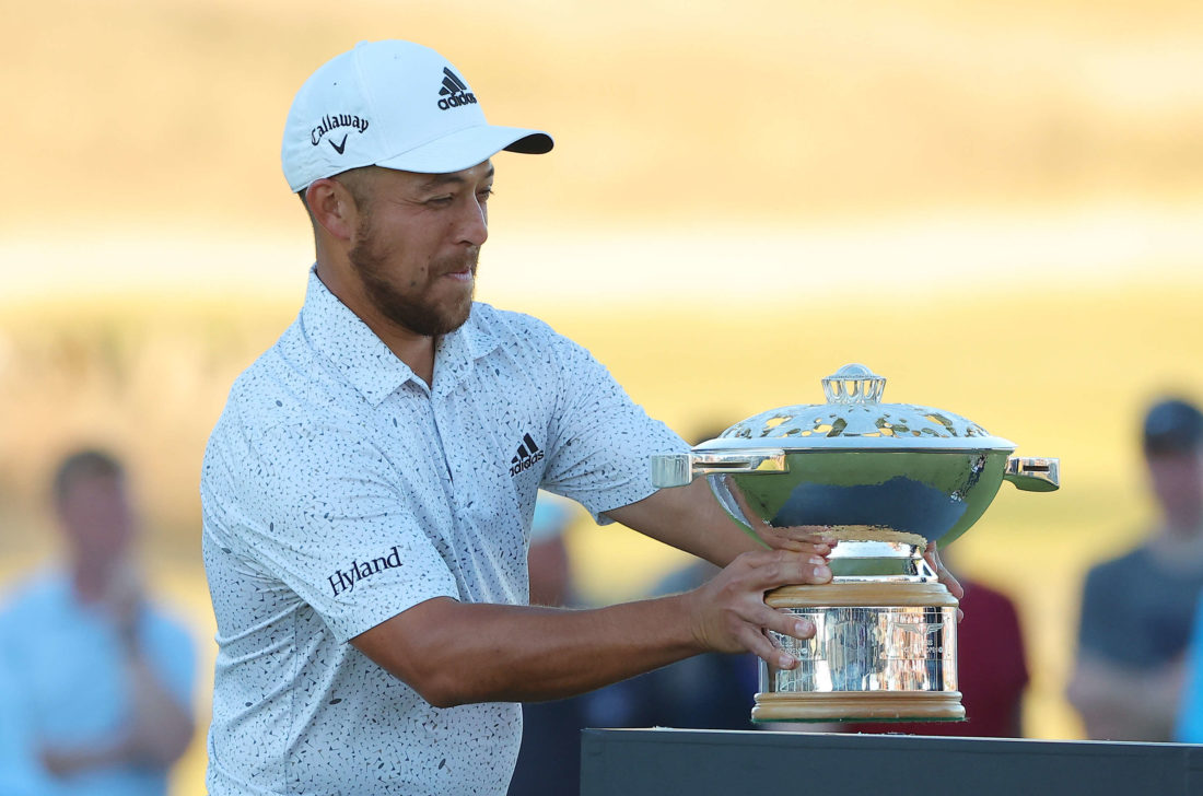 NORTH BERWICK, SCOTLAND - JULY 10: Xander Schauffele of the United States celebrates with the trophy after winning the Genesis Scottish Open at The Renaissance Club on July 10, 2022 in North Berwick, Scotland. (Photo by Kevin C. Cox/Getty Images)