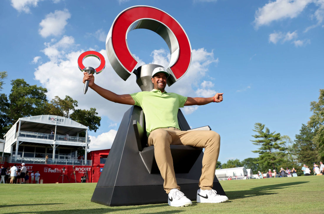DETROIT, MICHIGAN - JULY 31: Tony Finau of the United States poses with the trophy after winning the Rocket Mortgage Classic at Detroit Golf Club on July 31, 2022 in Detroit, Michigan. (Photo by Gregory Shamus/Getty Images)