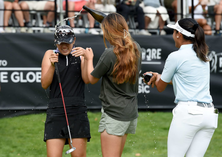 PORTLAND, OREGON tour news - SEPTEMBER 18: Fellow golfers spray Andrea Lee with champagne after winning the AmazingCre Portland Classic at Columbia Edgewater Country Club on September 18, 2022 in Portland, Oregon. (Photo by Steve Dykes/Getty Images)