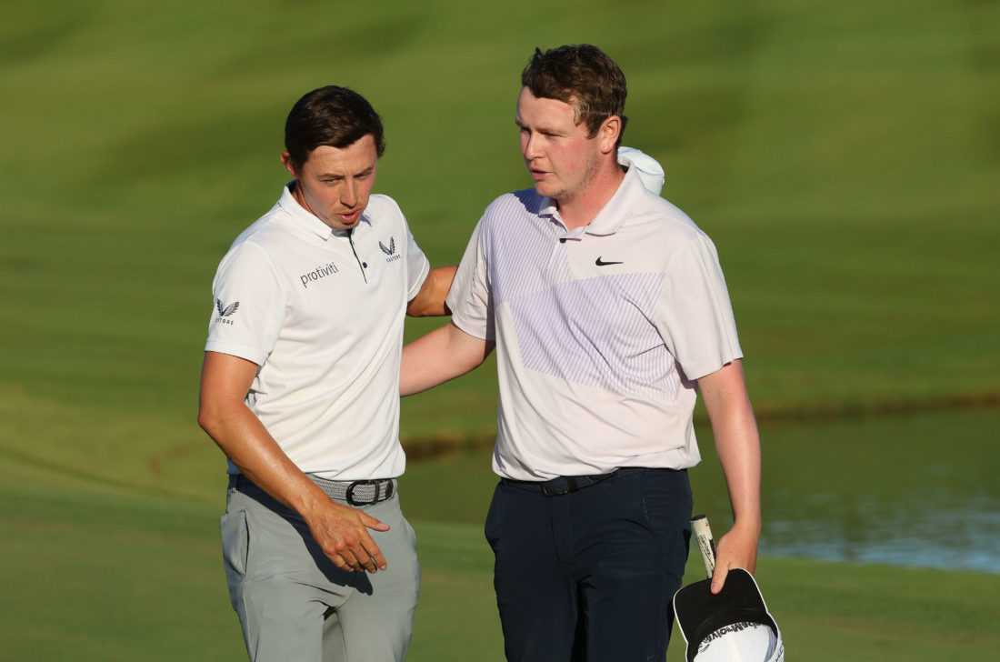 ROME, ITALY - SEPTEMBER 18: Matthew Fitzpatrick of England embraces Robert MacIntyre of Scotland on the 18th green after the play off during a play off on Day Four of the DS Automobiles Italian Open 2022 at Marco Simone Golf Club on September 18, 2022 in Rome, Italy. tour news (Photo by Andrew Redington/Getty Images)