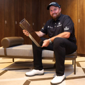 VIRGINIA WATER, ENGLAND - SEPTEMBER 11: Shane Lowry of Ireland poses for a photograph with the BMW PGA Championship trophy in the player's locker room after winning the tournament during Round Three on Day Four of the BMW PGA Championship at Wentworth Golf Club on September 11, 2022 in Virginia Water, England. tour news (Photo by Andrew Redington/Getty Images)